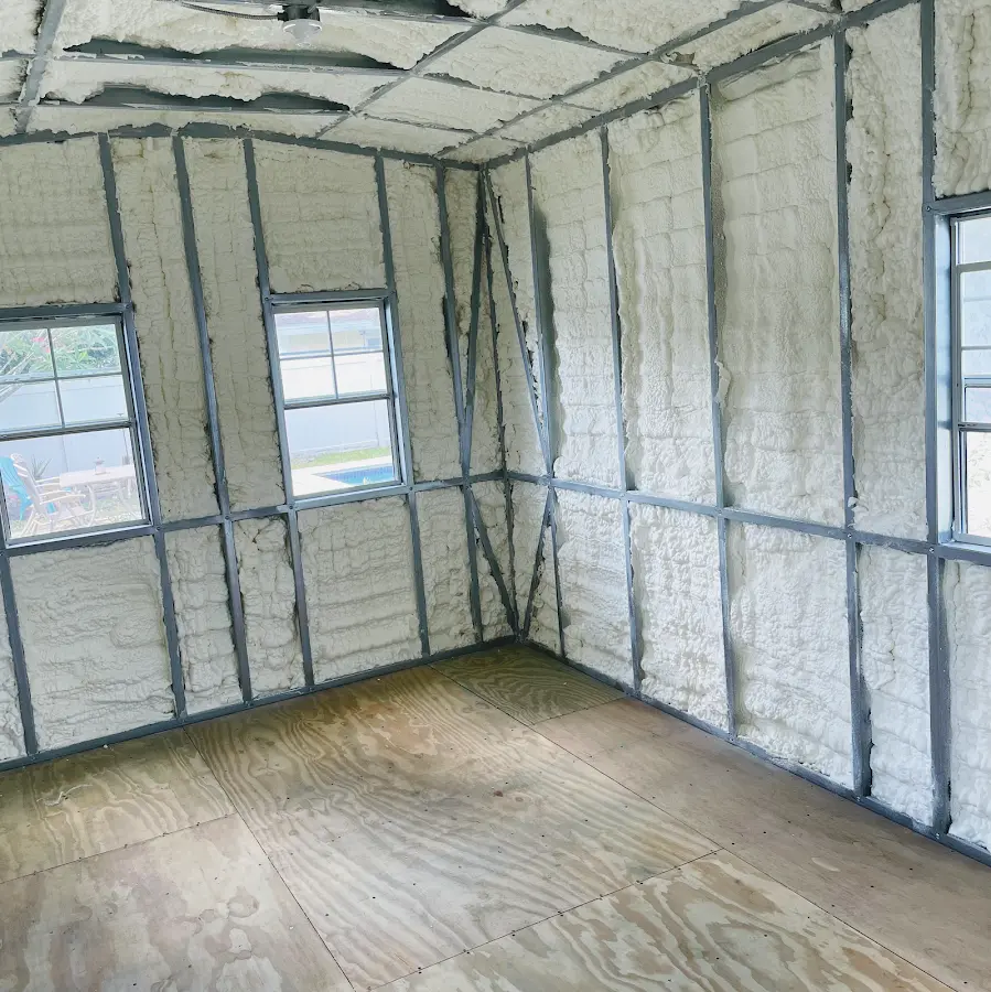 Closed-cell spray foam insulation applied to wall cavities in a residential project in Everett